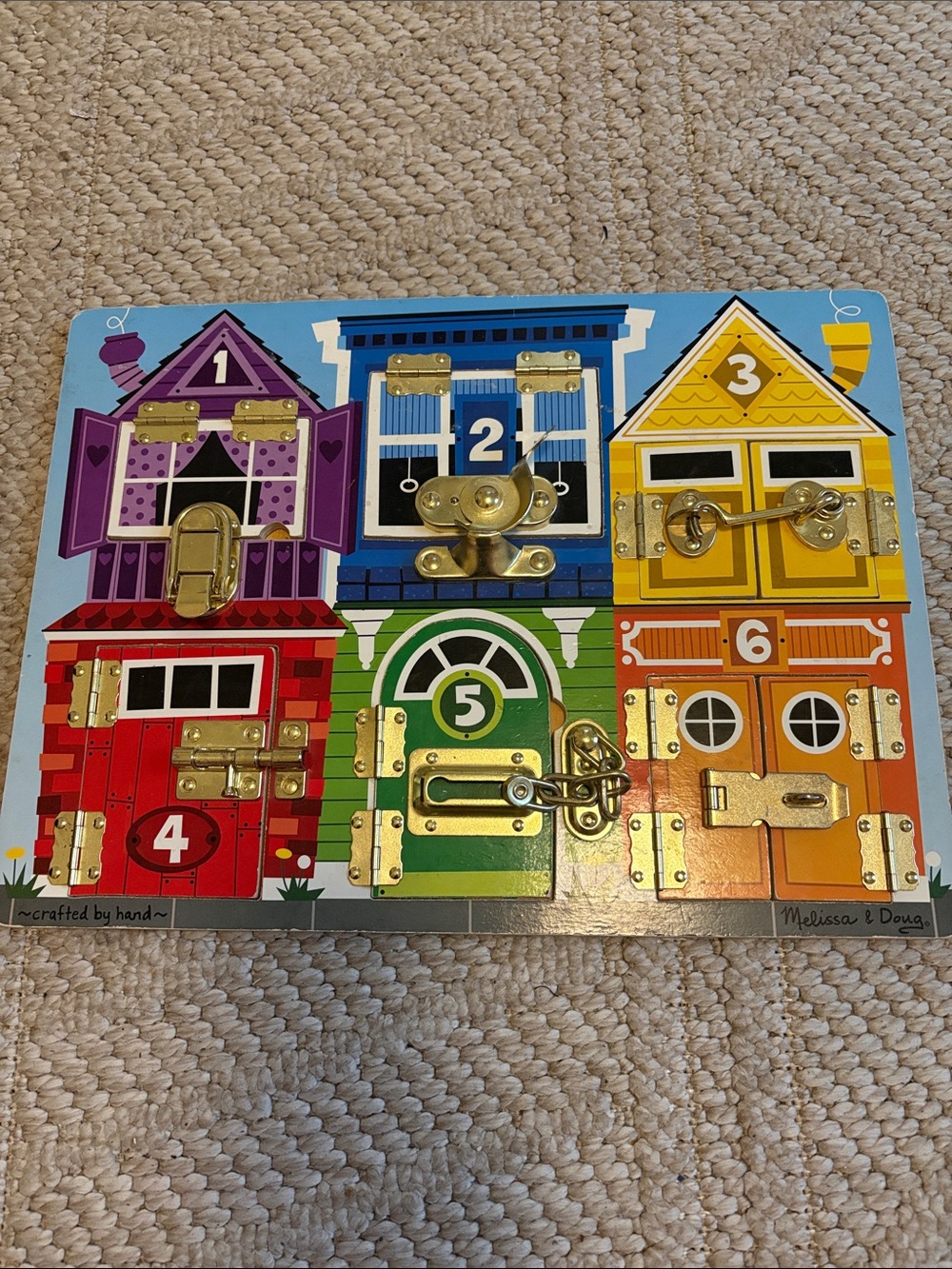 Melissa & Doug Latches board